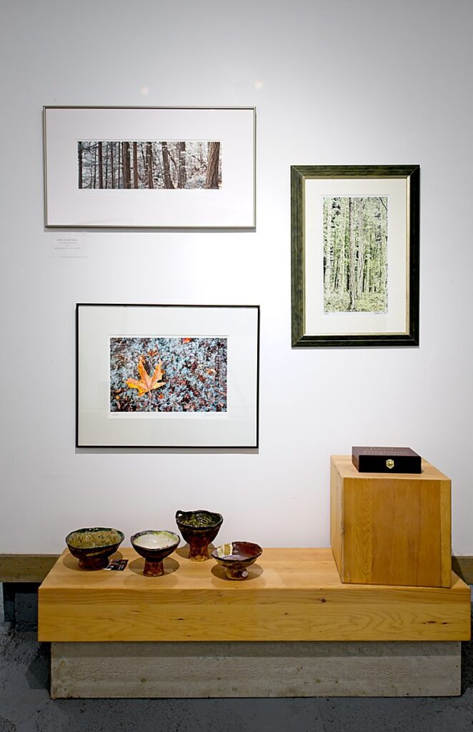 images and pottery display at Art in Art In The Barn Gallery